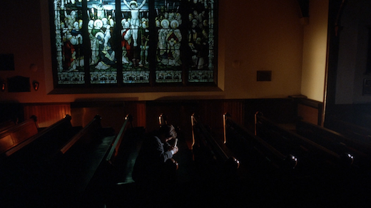 Mulder cries in a church