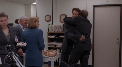 Jerry hugs a surprised but pleased Mulder.
