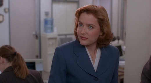 Scully gives Mulder a jealous look.